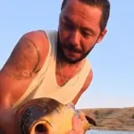 Farklı bir amaç | Yakaladıkları balıkları tekrar suya bırakıyorlar
